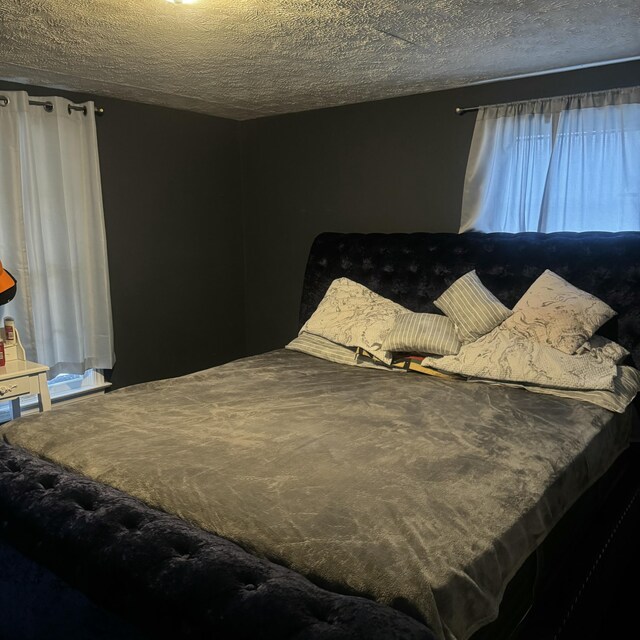 bedroom with a textured ceiling