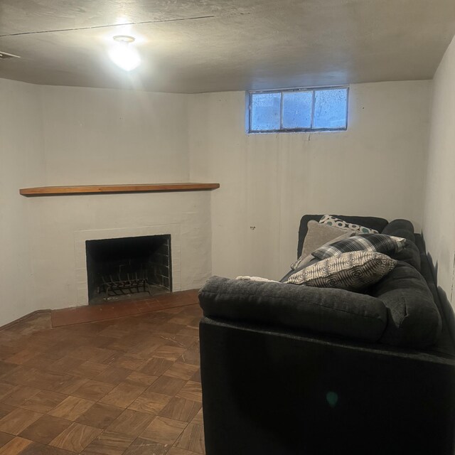 living room with dark parquet floors