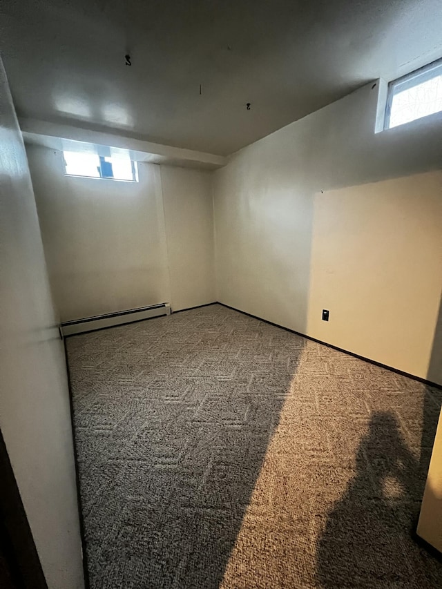 basement featuring carpet flooring and a wealth of natural light