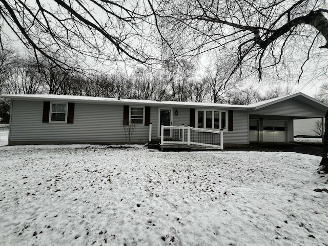 view of front of home featuring a carport