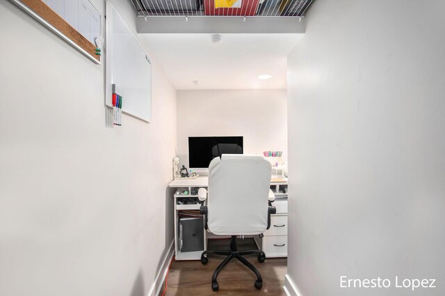 home office with hardwood / wood-style flooring