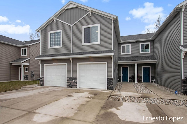 view of front of property with a garage