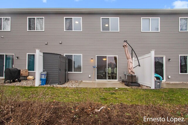 back of property with a patio area