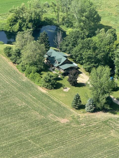 bird's eye view featuring a water view and a rural view