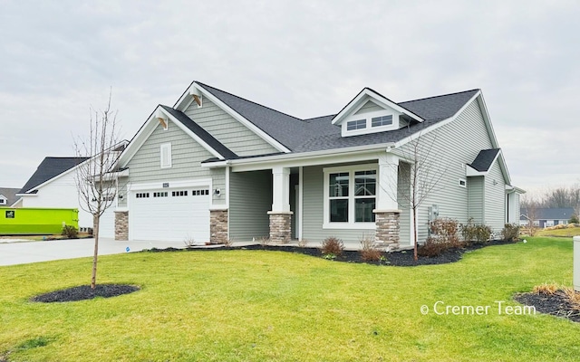 craftsman inspired home with a garage, a porch, and a front yard