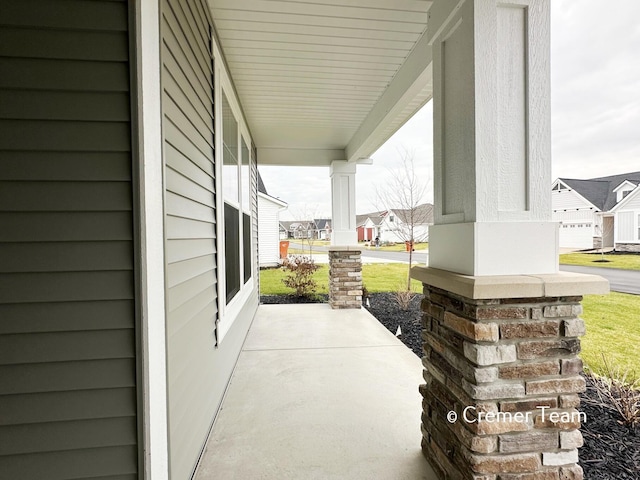 view of patio featuring a porch