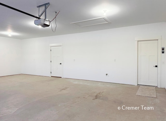 garage featuring a garage door opener