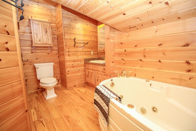 bathroom with wood-type flooring, wooden walls, toilet, and wooden ceiling