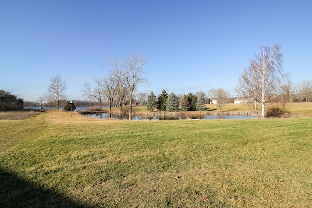 view of yard with a water view