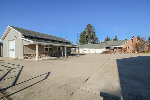 back of house featuring covered porch