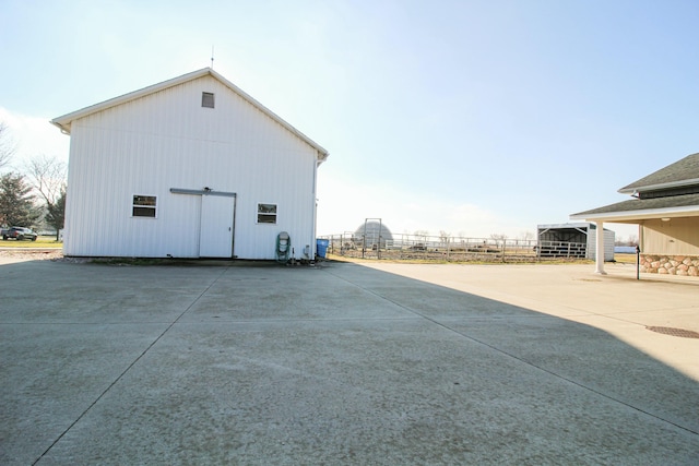 view of home's exterior with a carport