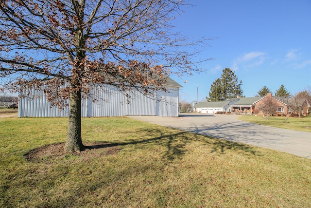 view of yard featuring a garage