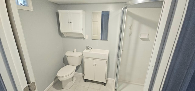 bathroom featuring tile patterned floors, vanity, toilet, and an enclosed shower