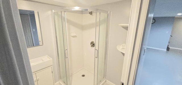 bathroom with vanity and walk in shower