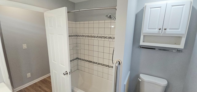 bathroom with wood-type flooring and toilet