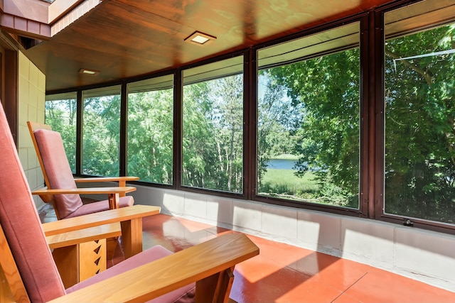 sunroom with wood ceiling