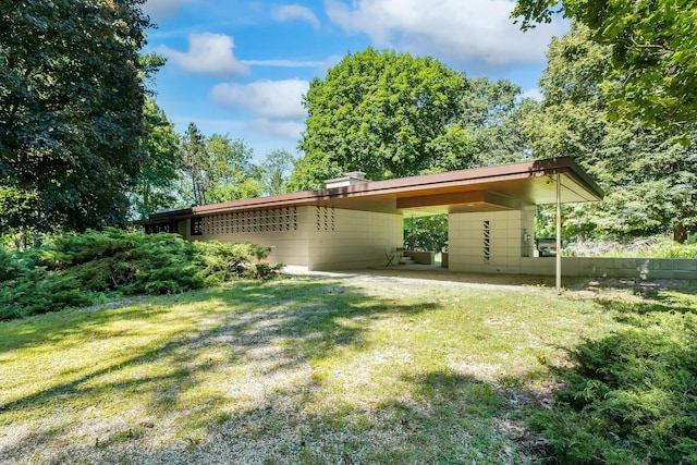 exterior space featuring a carport