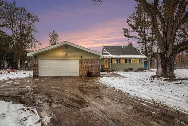 view of front of home with a garage