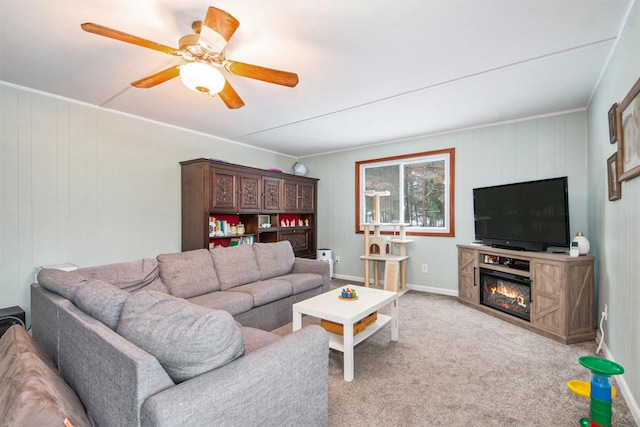 living room featuring ceiling fan and light colored carpet