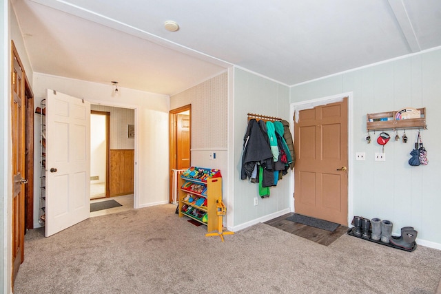 view of carpeted foyer