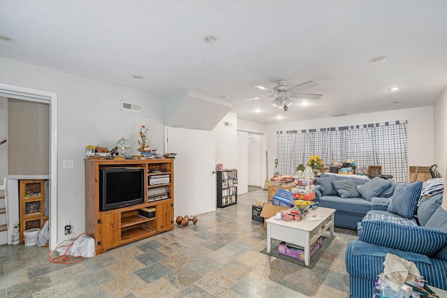 living room with ceiling fan