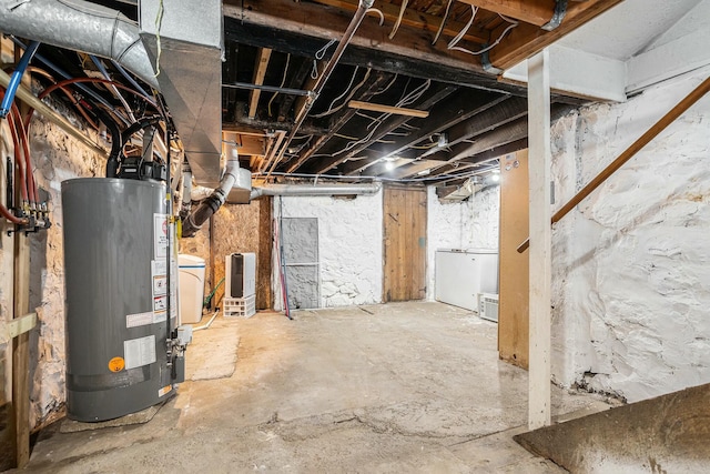 basement featuring gas water heater