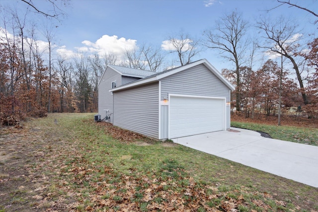 garage featuring a yard