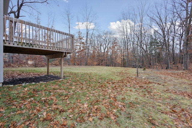 view of yard featuring a wooden deck