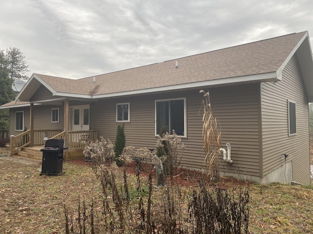 back of house featuring french doors