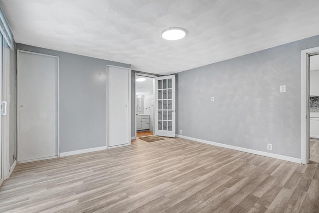 unfurnished bedroom featuring light hardwood / wood-style flooring