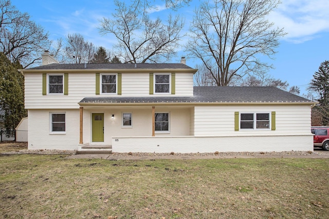 front facade with a front lawn