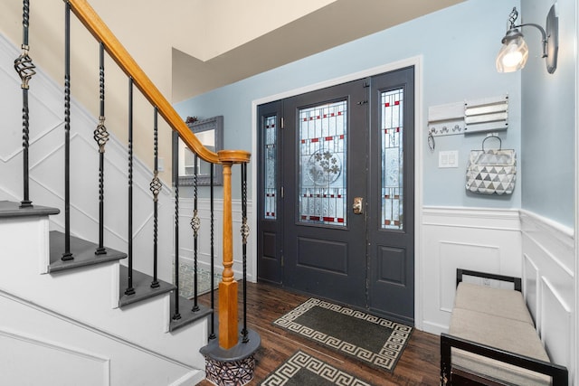 entrance foyer with dark hardwood / wood-style floors