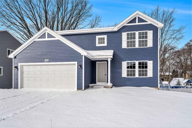 view of front of property featuring a garage