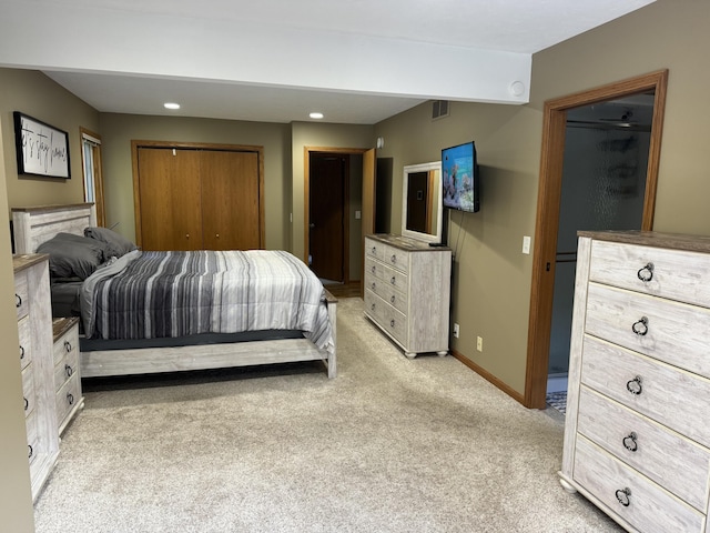 bedroom with light carpet