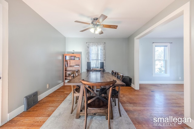 dining room featuring light wood-type flooring and ceiling fan