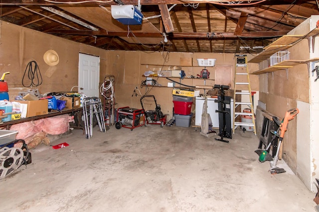 garage featuring a garage door opener