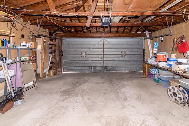 garage featuring a garage door opener