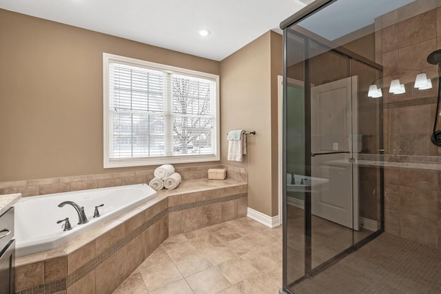 bathroom with shower with separate bathtub and vanity