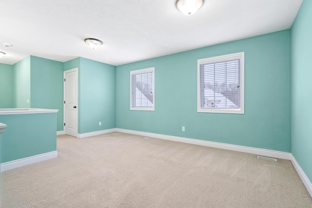 view of carpeted spare room