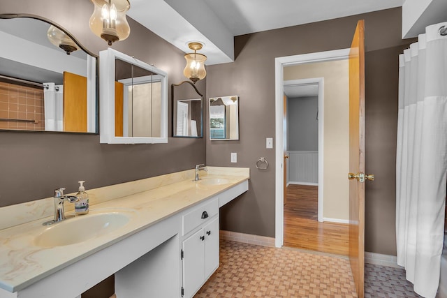 bathroom featuring vanity and walk in shower