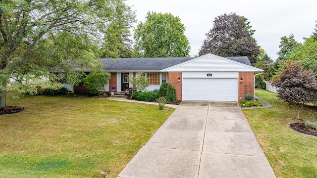 ranch-style home with a front yard and a garage