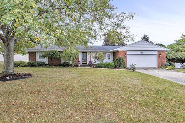 ranch-style home with a front yard and a garage