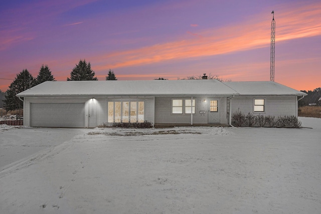 single story home with a garage