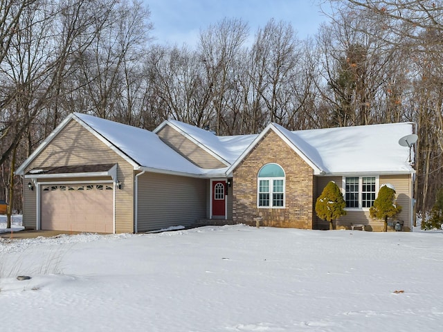 single story home with a garage