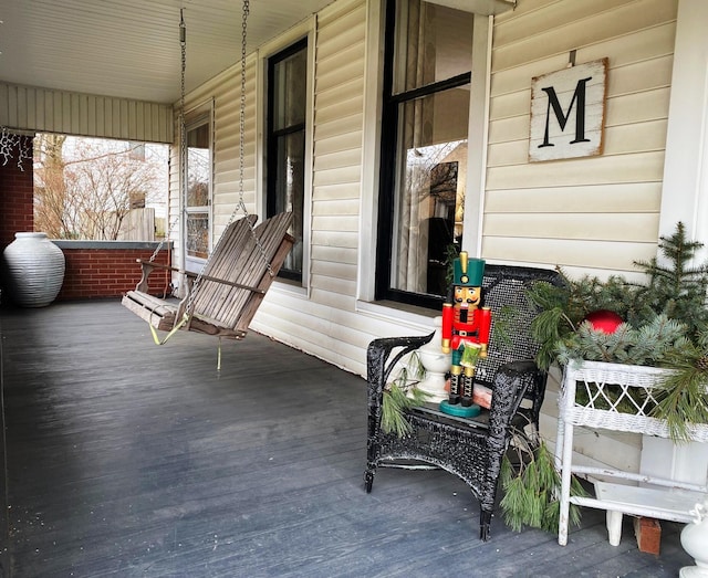 wooden terrace with covered porch