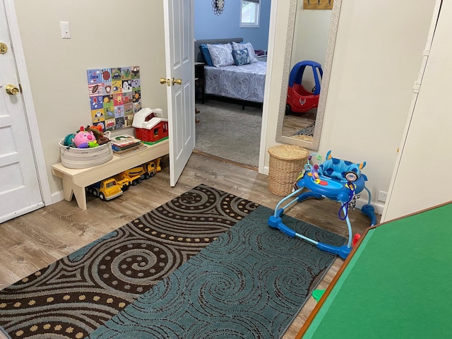 interior space with hardwood / wood-style flooring