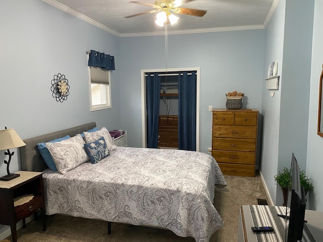 carpeted bedroom featuring ceiling fan and crown molding