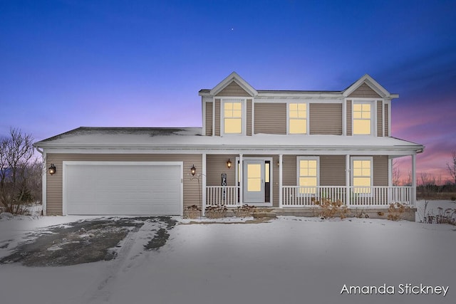 view of front of home with a garage