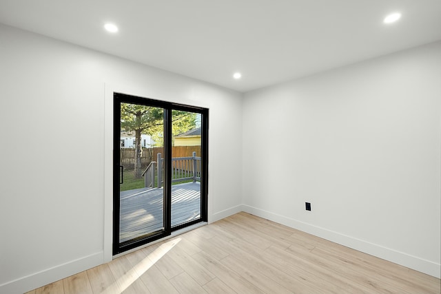 empty room with light wood-type flooring