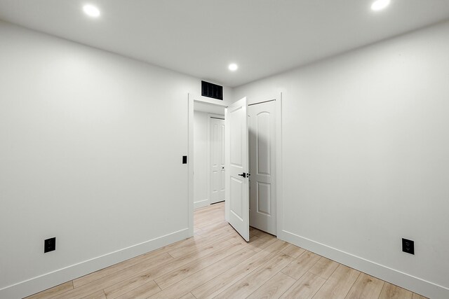 unfurnished bedroom with light hardwood / wood-style floors